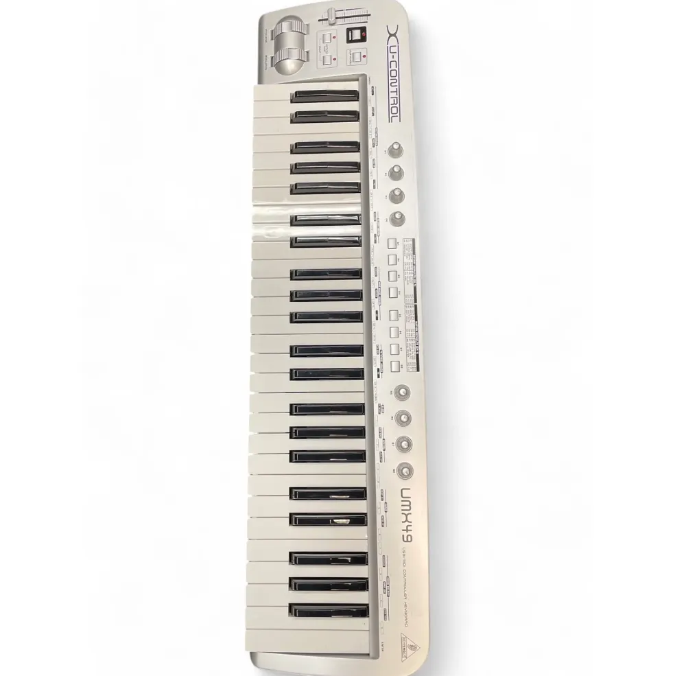 Used Behringer UMX49 49-Key USB MIDI Controller
